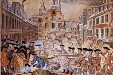 An illustration of the Boston Massacre with a line of British soldiers firing into a crowd on the street.