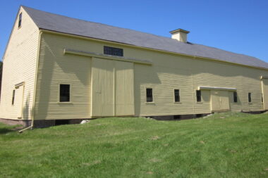 A photo of the exterior of the barn at Spencer-Peirce-Little Farm.